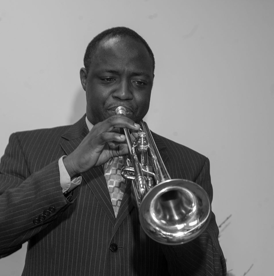 Philip Olaomi playing trumpet